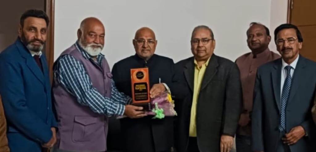 A ceremony was held to honor Ashok Puri the director of the film Gold Medal Da Dahej for receiving the Award for Excellence in Social Awareness